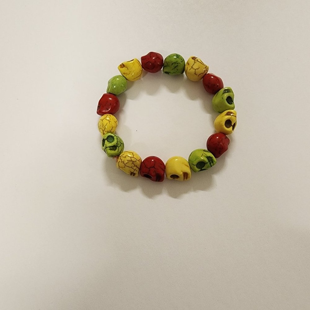 Small Red, Yellow, Green skull magnesite bead bracelet - elastic